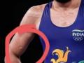 Repeatedly bitten by opponent, but wrestler Dahiya emerged on top - Hindi News | Repeatedly bitten by opponent, but wrestler Dahiya emerged on top | Latest other-sports News at Lokmattimes.com