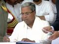 Siddaramaiah takes oath as 24th CM of K'taka - Hindi News | Siddaramaiah takes oath as 24th CM of K'taka | Latest politics News at Lokmattimes.com