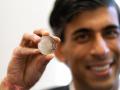 UK unveils coin on Mahatma to mark Diwali - Hindi News | UK unveils coin on Mahatma to mark Diwali | Latest international News at Lokmattimes.com