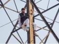 Denied ticket for MCD polls, ex-AAP councillor climbs atop transmission tower - Hindi News | Denied ticket for MCD polls, ex-AAP councillor climbs atop transmission tower | Latest politics News at Lokmattimes.com