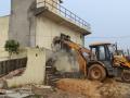 Gurugram: Illegal constructions in Rithoj village razed amid resistance - Hindi News | Gurugram: Illegal constructions in Rithoj village razed amid resistance | Latest politics News at Lokmattimes.com