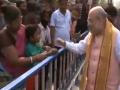 Amit Shah shares adorable moment with young boy in West Bengal - Hindi News | Amit Shah shares adorable moment with young boy in West Bengal | Latest national News at Lokmattimes.com