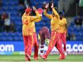 T20 WC: Raza's heroics trigger yet another collapse, West Indies restricted to modest 153/7 - Hindi News | T20 WC: Raza's heroics trigger yet another collapse, West Indies restricted to modest 153/7 | Latest cricket News at Lokmattimes.com