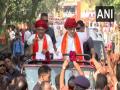 Gujarat: Amit Shah, Gujarat CM hold roadshow in Ghatlodiya - Hindi News | Gujarat: Amit Shah, Gujarat CM hold roadshow in Ghatlodiya | Latest national News at Lokmattimes.com