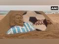 Sudarshan Pattnaik creates Argentinian footballer Maradona's sculpture on his death anniversary - Hindi News | Sudarshan Pattnaik creates Argentinian footballer Maradona's sculpture on his death anniversary | Latest entertainment News at Lokmattimes.com
