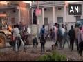 MP: Locals pelt stones at bulldozer during anti-encroachment drive in Ujjain - Hindi News | MP: Locals pelt stones at bulldozer during anti-encroachment drive in Ujjain | Latest national News at Lokmattimes.com