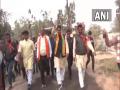 Tripura CM Manik Saha conducts door to door campaign in Agartala, ahead of state Elections - Hindi News | Tripura CM Manik Saha conducts door to door campaign in Agartala, ahead of state Elections | Latest politics News at Lokmattimes.com