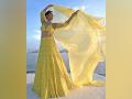Surveen Chawla brings desi glam at Cannes 2023 in yellow lehenga - Hindi News | Surveen Chawla brings desi glam at Cannes 2023 in yellow lehenga | Latest entertainment News at Lokmattimes.com