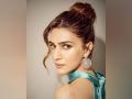 "I froze for a moment, treated myself with a pizza": Kriti Sanon on her National Award win - Hindi News | "I froze for a moment, treated myself with a pizza": Kriti Sanon on her National Award win | Latest entertainment News at Lokmattimes.com