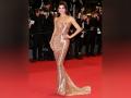 Jacqueline Fernandez dazzles in shimmery golden gown at 2024 Cannes red carpet - Hindi News | Jacqueline Fernandez dazzles in shimmery golden gown at 2024 Cannes red carpet | Latest entertainment News at Lokmattimes.com