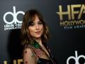 Dakota Johnson "slowly dating again" months after parting ways with Coldplay's Chris Martin - Hindi News | Dakota Johnson "slowly dating again" months after parting ways with Coldplay's Chris Martin | Latest entertainment News at Lokmattimes.com