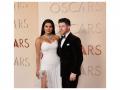 Oscars 2026: Priyanka Chopra stuns in white Dior gown, walks red carpet hand-in-hand with husband Nick Jonas - Hindi News | Oscars 2026: Priyanka Chopra stuns in white Dior gown, walks red carpet hand-in-hand with husband Nick Jonas | Latest entertainment News at Lokmattimes.com