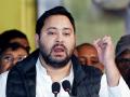 Some join BJP out of greed or fear, says RJD's Tejashwi Yadav on AAP's split in Rajya Sabha - Hindi News | Some join BJP out of greed or fear, says RJD's Tejashwi Yadav on AAP's split in Rajya Sabha | Latest politics News at Lokmattimes.com