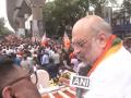 Amit Shah holds massive roadshow in Behala Paschim in final push for Bengal - Hindi News | Amit Shah holds massive roadshow in Behala Paschim in final push for Bengal | Latest politics News at Lokmattimes.com