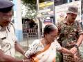 WB polls: Security forces officials assist elderly voters to cast their votes - Hindi News | WB polls: Security forces officials assist elderly voters to cast their votes | Latest national News at Lokmattimes.com