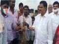 TDP leader visits submerged farm fields, demands immediate compensation for crop losses - Hindi News | TDP leader visits submerged farm fields, demands immediate compensation for crop losses | Latest national News at Lokmattimes.com