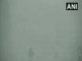 Delhi's AQI in 'poor category', vehicles move through dense fog - Hindi News | Delhi's AQI in 'poor category', vehicles move through dense fog | Latest national News at Lokmattimes.com