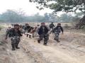 CRPF team carry pregnant woman on cot for 6 km through jungles to reach hospital - Hindi News | CRPF team carry pregnant woman on cot for 6 km through jungles to reach hospital | Latest national News at Lokmattimes.com