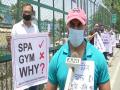Gym instructors protest in Dehradun, demand gymnasiums to reopen - Hindi News | Gym instructors protest in Dehradun, demand gymnasiums to reopen | Latest national News at Lokmattimes.com