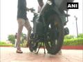 Gujarat college students develop motorbike that runs on petrol, electricity - Hindi News | Gujarat college students develop motorbike that runs on petrol, electricity | Latest national News at Lokmattimes.com