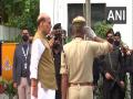 Rajnath Singh hoists national flag at his residence in Delhi - Hindi News | Rajnath Singh hoists national flag at his residence in Delhi | Latest national News at Lokmattimes.com
