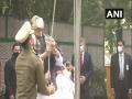 Rajnath Singh unfurls tricolour at his residence on Republic Day - Hindi News | Rajnath Singh unfurls tricolour at his residence on Republic Day | Latest national News at Lokmattimes.com