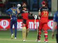 IPL 2021: Maxwell, Kohli power RCB to 165/6 against MI - Hindi News | IPL 2021: Maxwell, Kohli power RCB to 165/6 against MI | Latest cricket News at Lokmattimes.com
