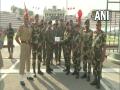 BSF, Pakistan Rangers exchange sweets at Attari-Wagah border on Diwali - Hindi News | BSF, Pakistan Rangers exchange sweets at Attari-Wagah border on Diwali | Latest national News at Lokmattimes.com