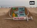 Odisha: Sudarsan Pattnaik creates sand art at Puri beach, appeals people to follow COVID protocols - Hindi News | Odisha: Sudarsan Pattnaik creates sand art at Puri beach, appeals people to follow COVID protocols | Latest national News at Lokmattimes.com