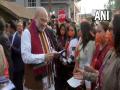 Amit Shah holds door-to-door campaign in Manipur's Churachandpur - Hindi News | Amit Shah holds door-to-door campaign in Manipur's Churachandpur | Latest politics News at Lokmattimes.com