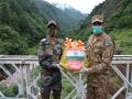 Eid-ul-Adha: BSF, Pak rangers exchange sweets for first time since Article 370 abrogation - Hindi News | Eid-ul-Adha: BSF, Pak rangers exchange sweets for first time since Article 370 abrogation | Latest national News at Lokmattimes.com