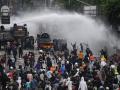 Indonesian Police, demonstrators clash on third day of protest over contentious omnibus bill - Hindi News | Indonesian Police, demonstrators clash on third day of protest over contentious omnibus bill | Latest international News at Lokmattimes.com