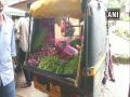 COVID-19: Auto rickshaw owner uses his vehicles as cart to sell vegetables in Kerala - Hindi News | COVID-19: Auto rickshaw owner uses his vehicles as cart to sell vegetables in Kerala | Latest national News at Lokmattimes.com