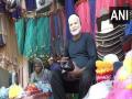 Uttar Pradesh: Holi fever grips Prayagraj, Modi masks in demand - Hindi News | Uttar Pradesh: Holi fever grips Prayagraj, Modi masks in demand | Latest national News at Lokmattimes.com