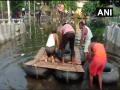 Bihar Floods: Locals construct makeshift boat to travel through streets - Hindi News | Bihar Floods: Locals construct makeshift boat to travel through streets | Latest national News at Lokmattimes.com