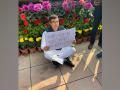 Parvesh Verma sits in protest with placard attacking AAP over alleged links with Kapil Gujjar - Hindi News | Parvesh Verma sits in protest with placard attacking AAP over alleged links with Kapil Gujjar | Latest national News at Lokmattimes.com