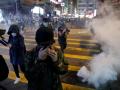 Hong Kong police resort to pepper spray, tear gas during Christmas protests - Hindi News | Hong Kong police resort to pepper spray, tear gas during Christmas protests | Latest international News at Lokmattimes.com