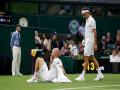 Wimbledon: Federer survives scare to reach second round as Mannarino retires with injury - Hindi News | Wimbledon: Federer survives scare to reach second round as Mannarino retires with injury | Latest tennis News at Lokmattimes.com