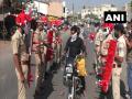 Policemen in Surat wear coronavirus-theme dresses to create awareness - Hindi News | Policemen in Surat wear coronavirus-theme dresses to create awareness | Latest national News at Lokmattimes.com