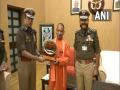 UP DGP, ADG present memento to CM on Police Flag Day - Hindi News | UP DGP, ADG present memento to CM on Police Flag Day | Latest national News at Lokmattimes.com