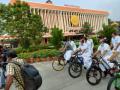 Kerala Oppn MLAs ride bicycles to Assembly in protest - Hindi News | Kerala Oppn MLAs ride bicycles to Assembly in protest | Latest politics News at Lokmattimes.com
