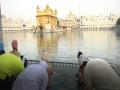 Amritsar: Devotees offer prayers, take holy dip at Golden Temple on occasion Baisakhi, amid lockdown - Hindi News | Amritsar: Devotees offer prayers, take holy dip at Golden Temple on occasion Baisakhi, amid lockdown | Latest national News at Lokmattimes.com