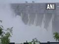 Amid heavy rains in Gujarat, massive amount of water discharged from Ukai Dam in Tapi - Hindi News | Amid heavy rains in Gujarat, massive amount of water discharged from Ukai Dam in Tapi | Latest national News at Lokmattimes.com