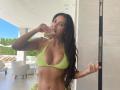 Kim Kardashian glows in neon bikini - Hindi News | Kim Kardashian glows in neon bikini | Latest lifestyle News at Lokmattimes.com