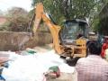Bulldozer rolls near Delhi's Rithala metro station - Hindi News | Bulldozer rolls near Delhi's Rithala metro station | Latest politics News at Lokmattimes.com
