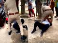 UP Police take suo moto cognizance of viral video, suspend constable for thrashing man - Hindi News | UP Police take suo moto cognizance of viral video, suspend constable for thrashing man | Latest national News at Lokmattimes.com