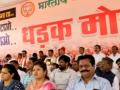 Maha BJP marches on the road seeking Nawab Malik's ouster - Hindi News | Maha BJP marches on the road seeking Nawab Malik's ouster | Latest maharashtra News at Lokmattimes.com
