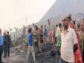 Dhanbad: Land caves in, three of a family rescued - Hindi News | Dhanbad: Land caves in, three of a family rescued | Latest national News at Lokmattimes.com