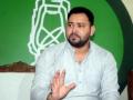 Candid camera: Tejashwi 'caught' distributing money to villagers ahead of polls - Hindi News | Candid camera: Tejashwi 'caught' distributing money to villagers ahead of polls | Latest politics News at Lokmattimes.com