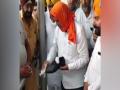 'Penance' for 'Panj Pyare' remark, Harish Rawat cleans devotees shoes, sweeps Uttarakhand Gurudwara's floor - Hindi News | 'Penance' for 'Panj Pyare' remark, Harish Rawat cleans devotees shoes, sweeps Uttarakhand Gurudwara's floor | Latest national News at Lokmattimes.com
